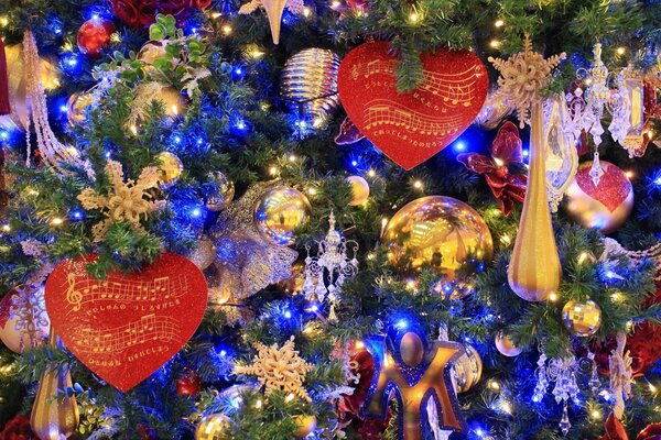 Christmas tree decorated with toys and garland