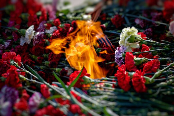 Eternal flame and carnation bouquets