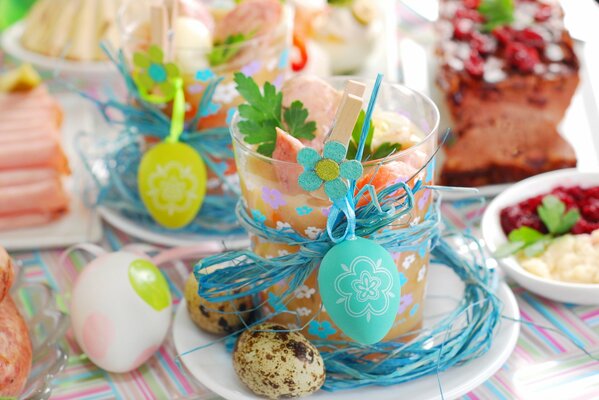 Smoothies in a glass on a plate with decoration