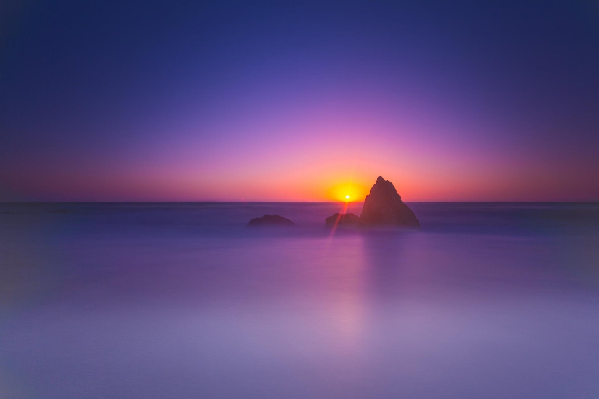 rock sea dawn landscape sky horizon sun