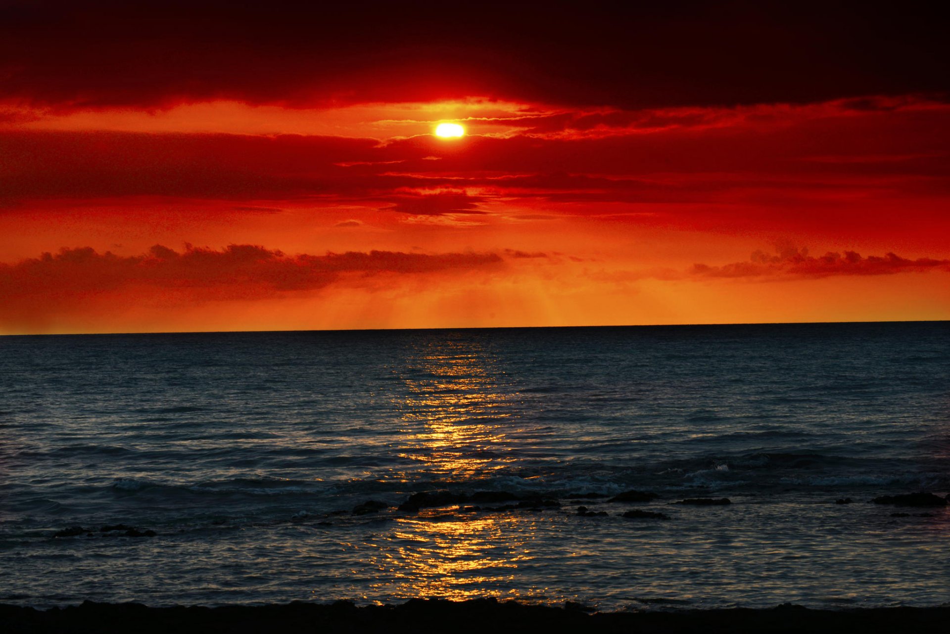 mar olas puesta de sol