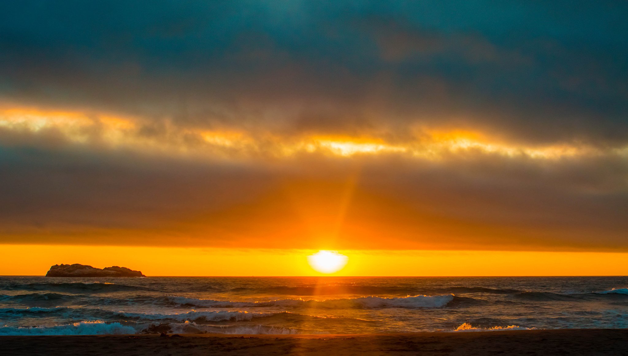 ky clouds clouds sun sunset sea waves rock island