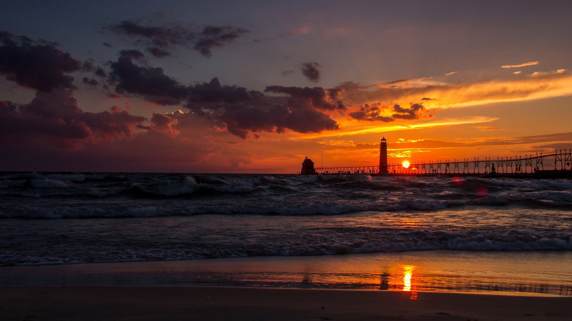 lake michigan vor dem sturm sonne sonnenuntergang gewitterwolken pier wellen