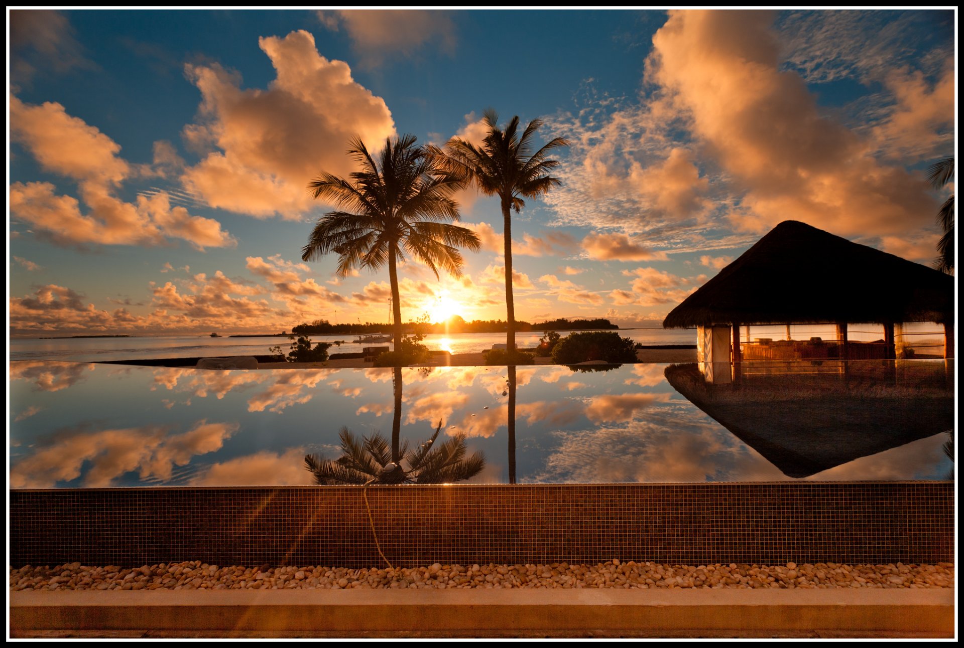 tramonto acqua palme cielo nuvole sole maldive