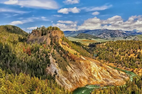 Mountainous terrain clouds sky autumn colors of nature