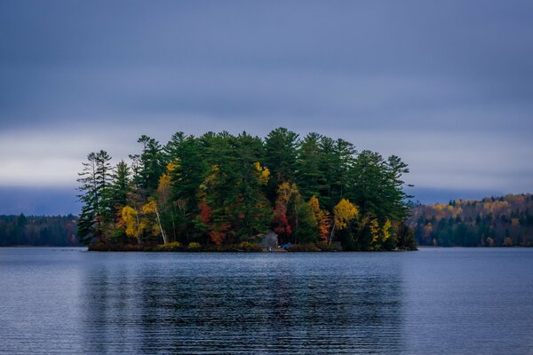 A mysterious island under a cloudy autumn sky