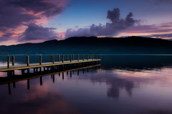 Sunset on the lake. Clouds in the sky