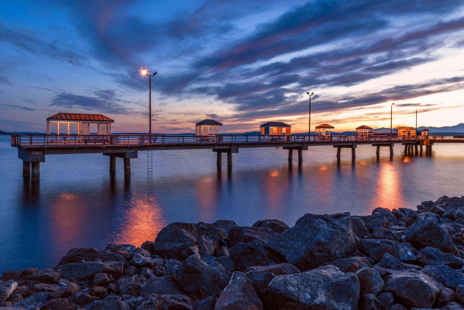 océano playa piedras muelle de pescadores paisaje