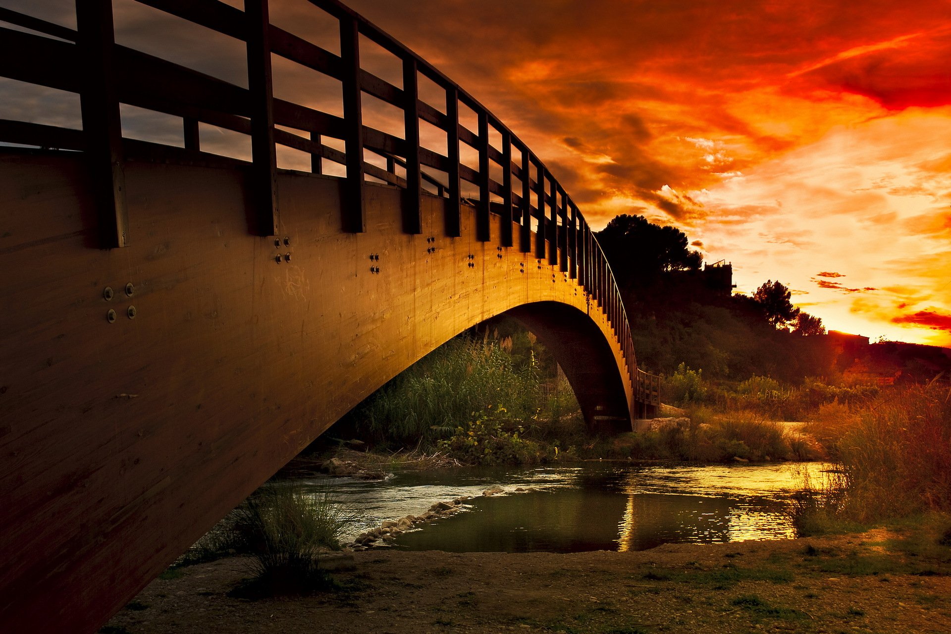 puesta de sol río puente