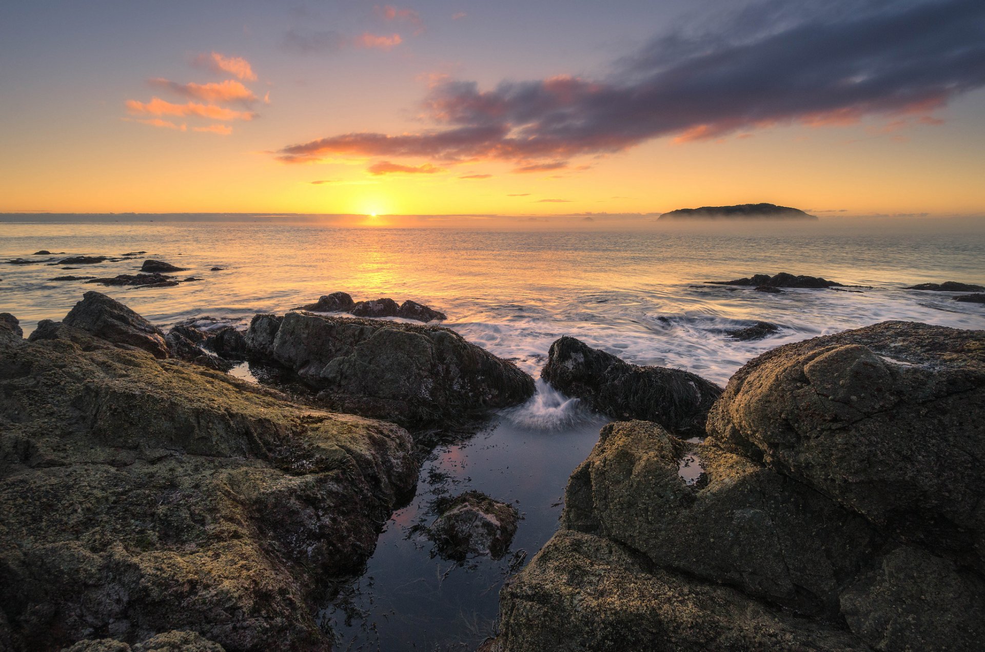 tairua waikato nueva zelanda océano mañana amanecer horizonte sol piedras