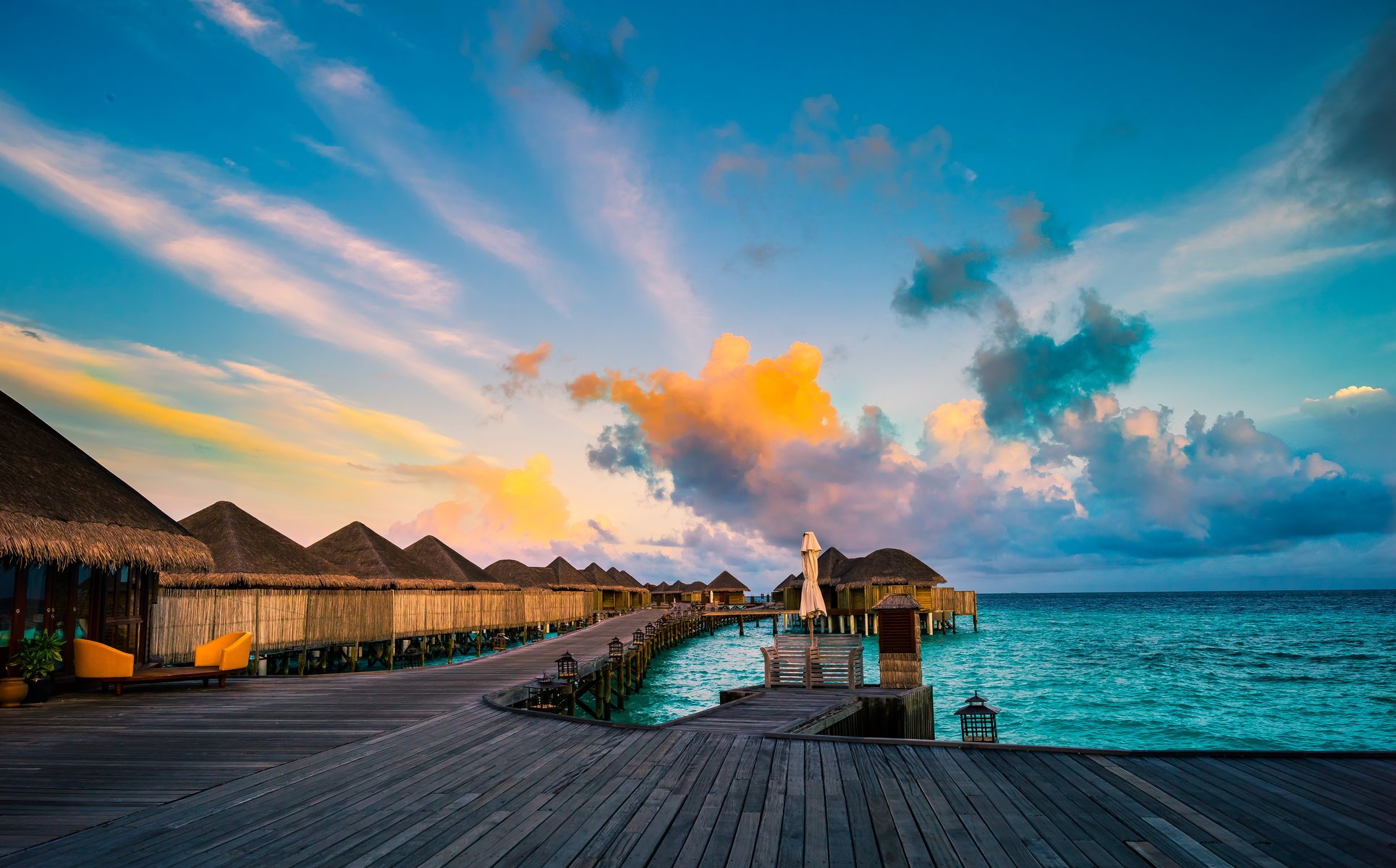 maldives tropiques mer bungalow ciel nuages horizon