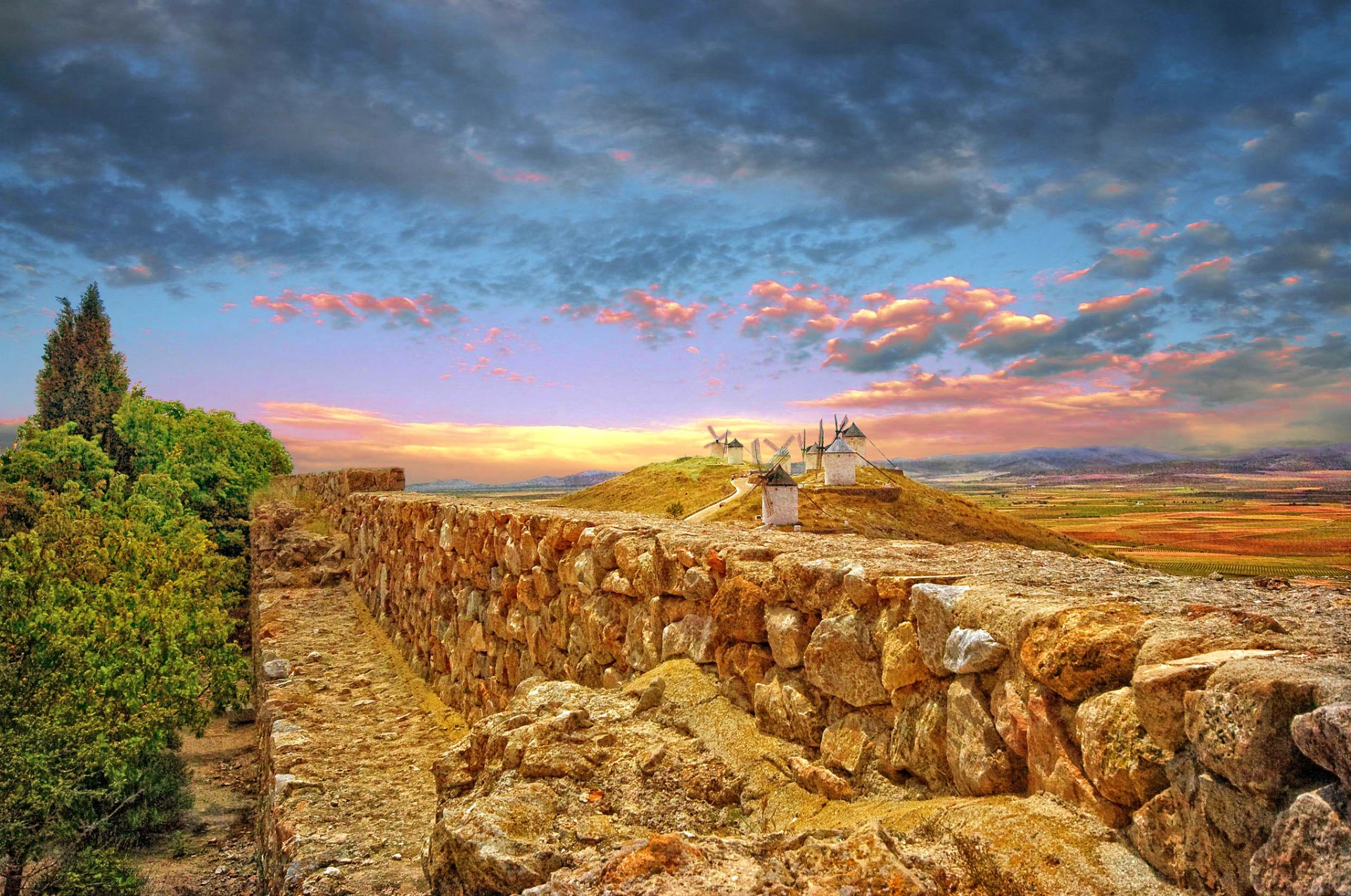 españa cielo nubes valla molino de viento colinas montañas