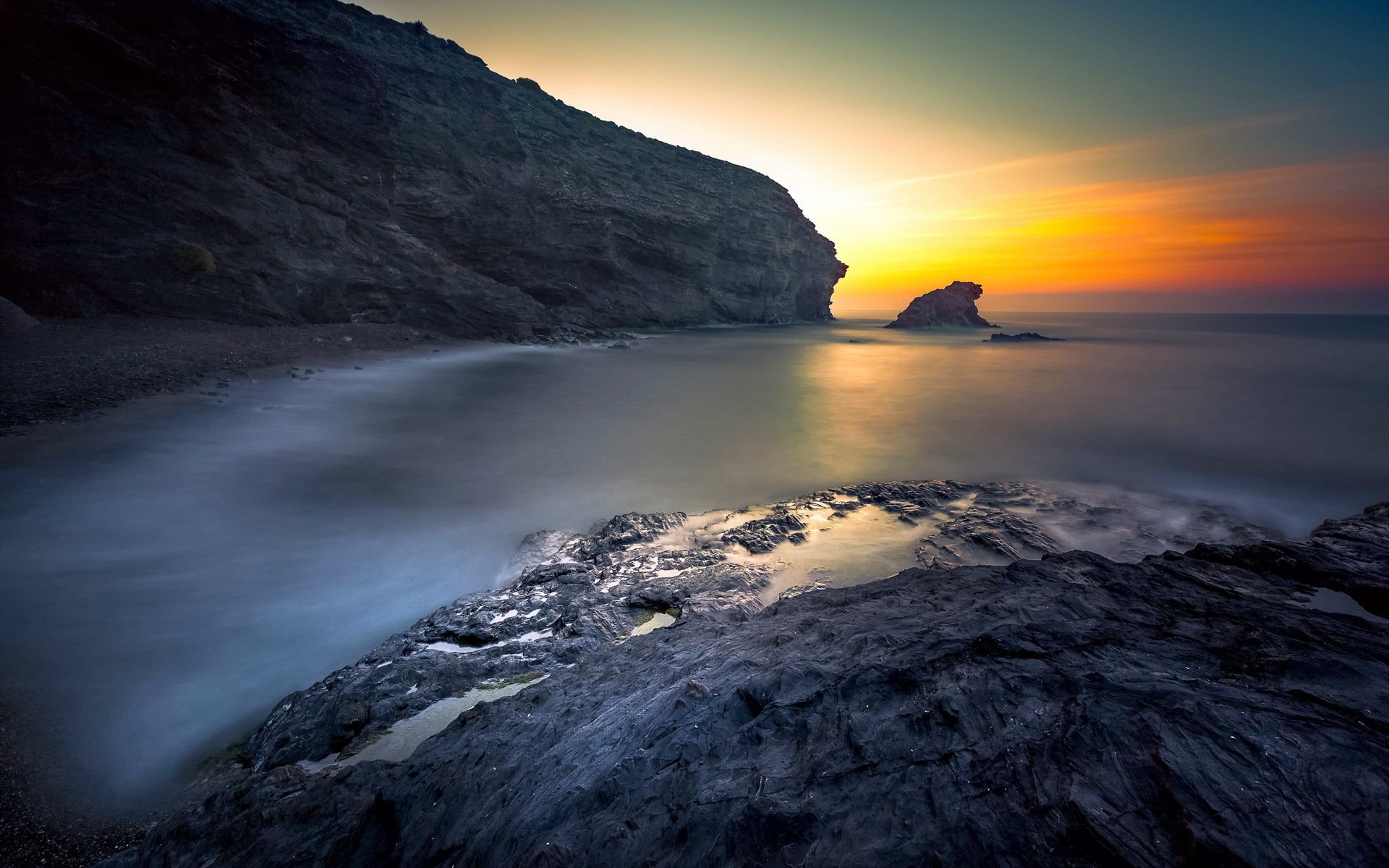 puesta de sol mar rocas paisaje