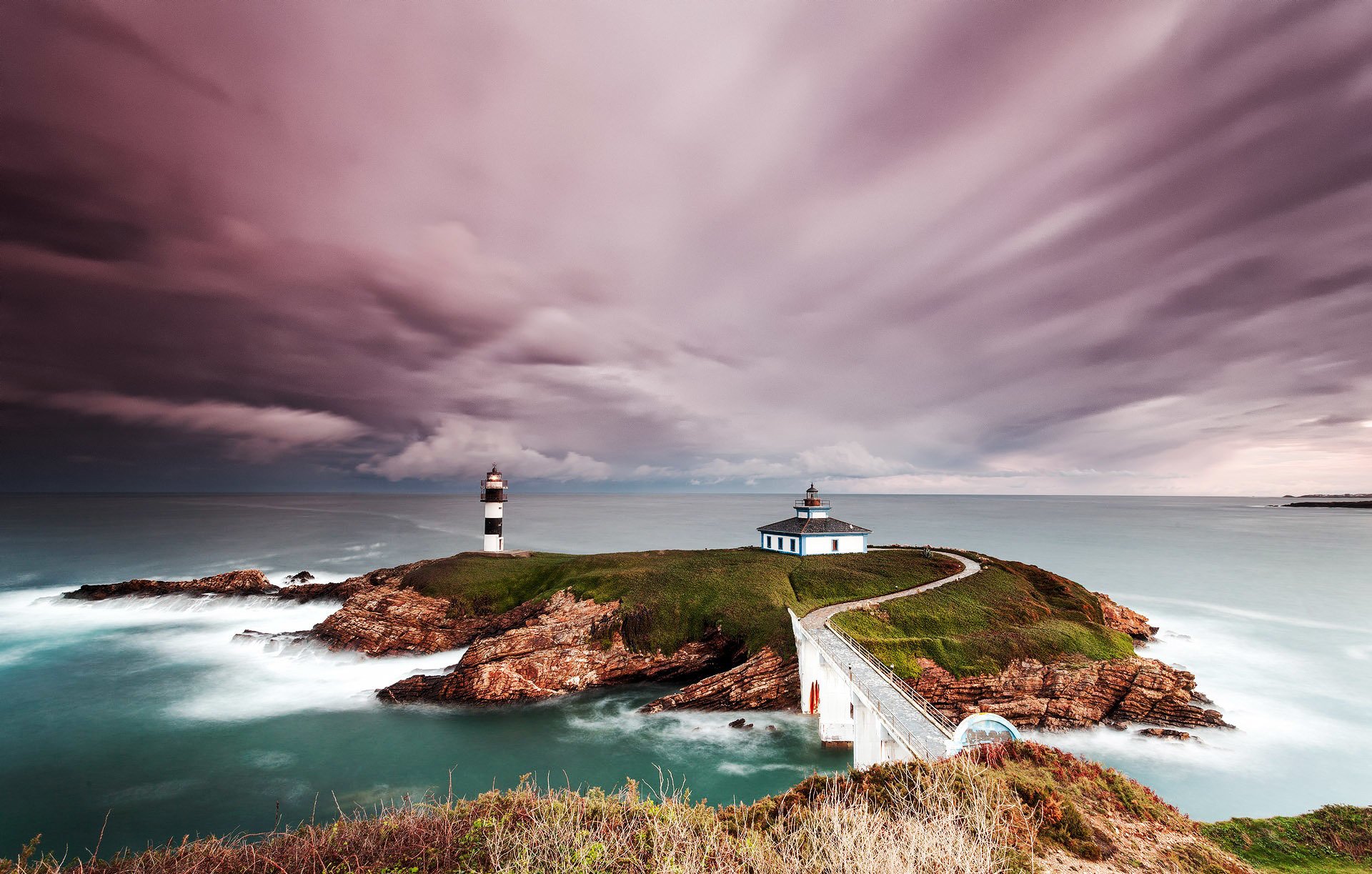 españa faro rocas cielo nubes