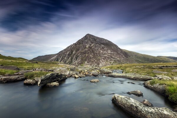 A beautiful river stretching to the mountain