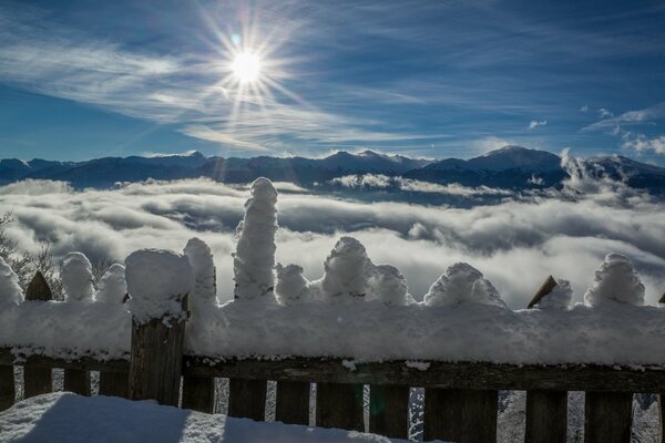 Snow-capped mountains, sunny winter