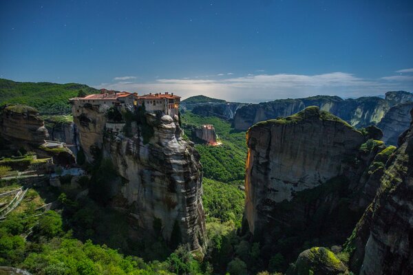 Greece. Monastery on a rock, around the heavenly beauty in flight