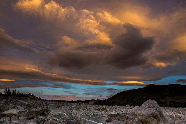 The rising sun in clouded clouds