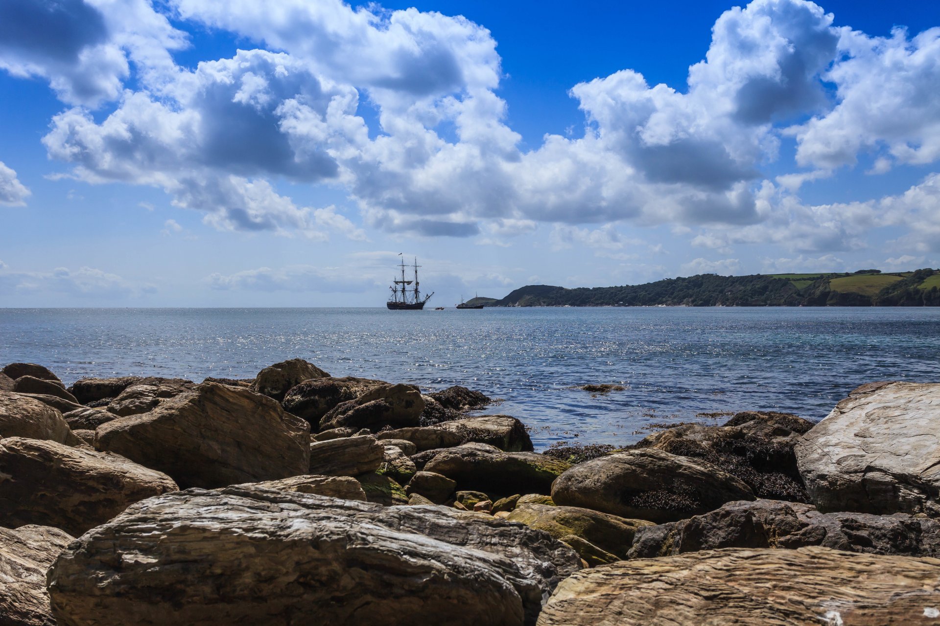 ea beach stones ship sailboats sky cloud