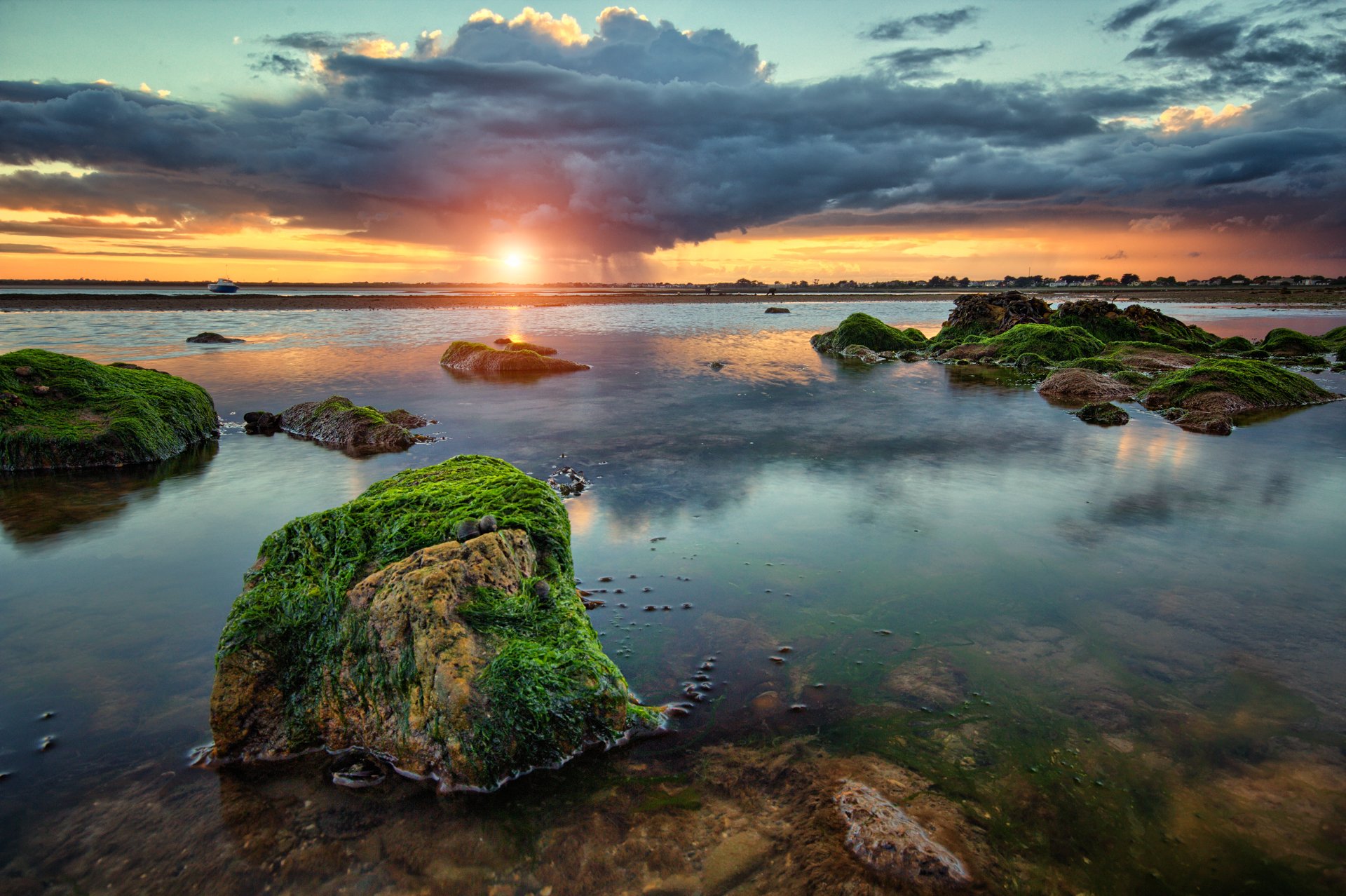 gulf stones algae clouds rain sunset