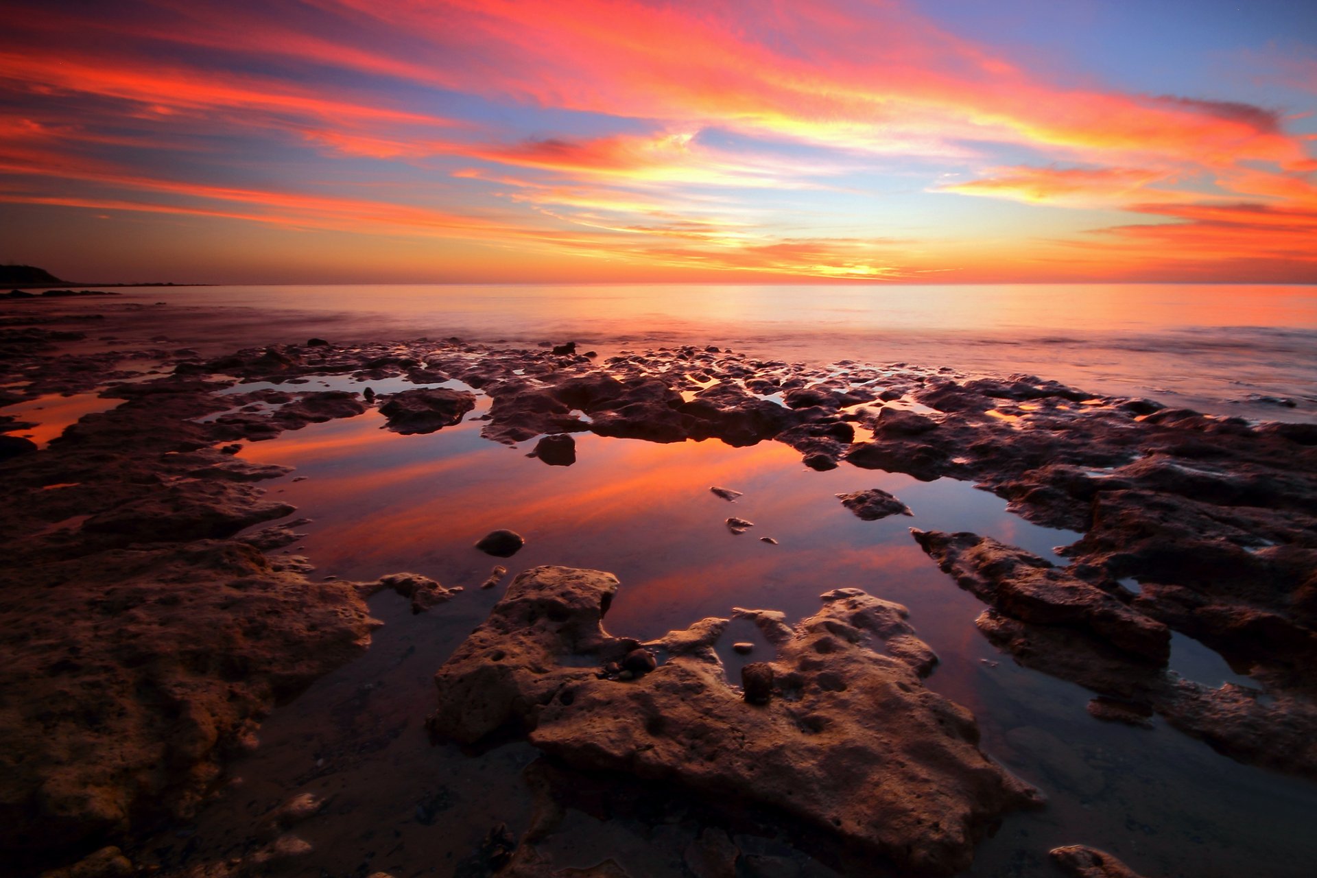 mare spiaggia pietre sera alba