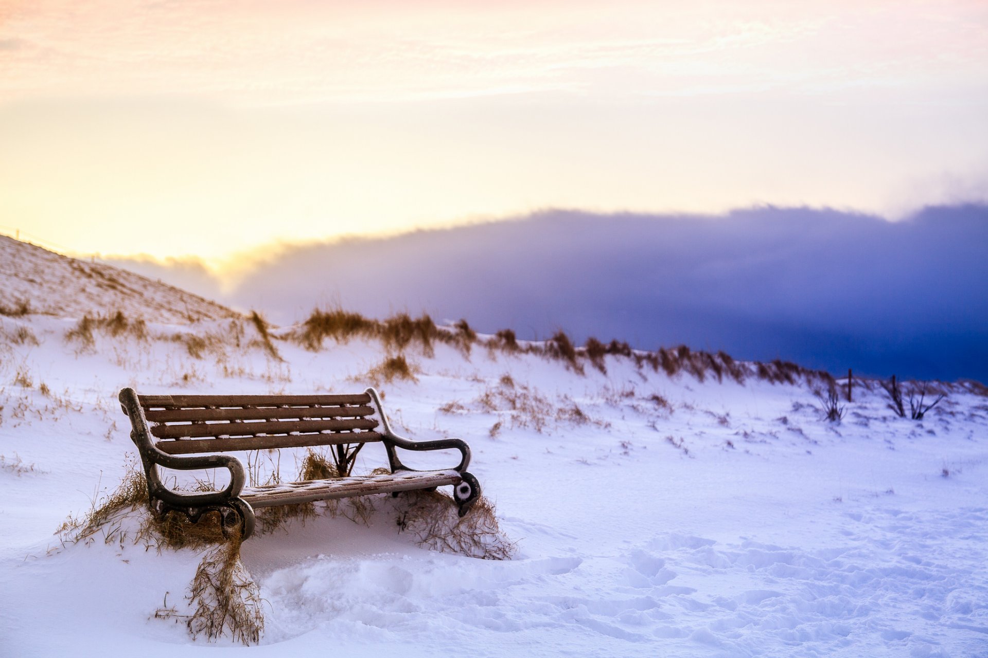 iceland winter snow traces sky clouds shop bench nature