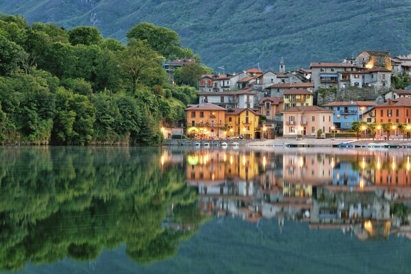 Lake mergozzo in the reflection of buildings