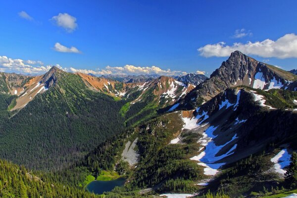 Green, blue, white, teracote mixed in the mountains