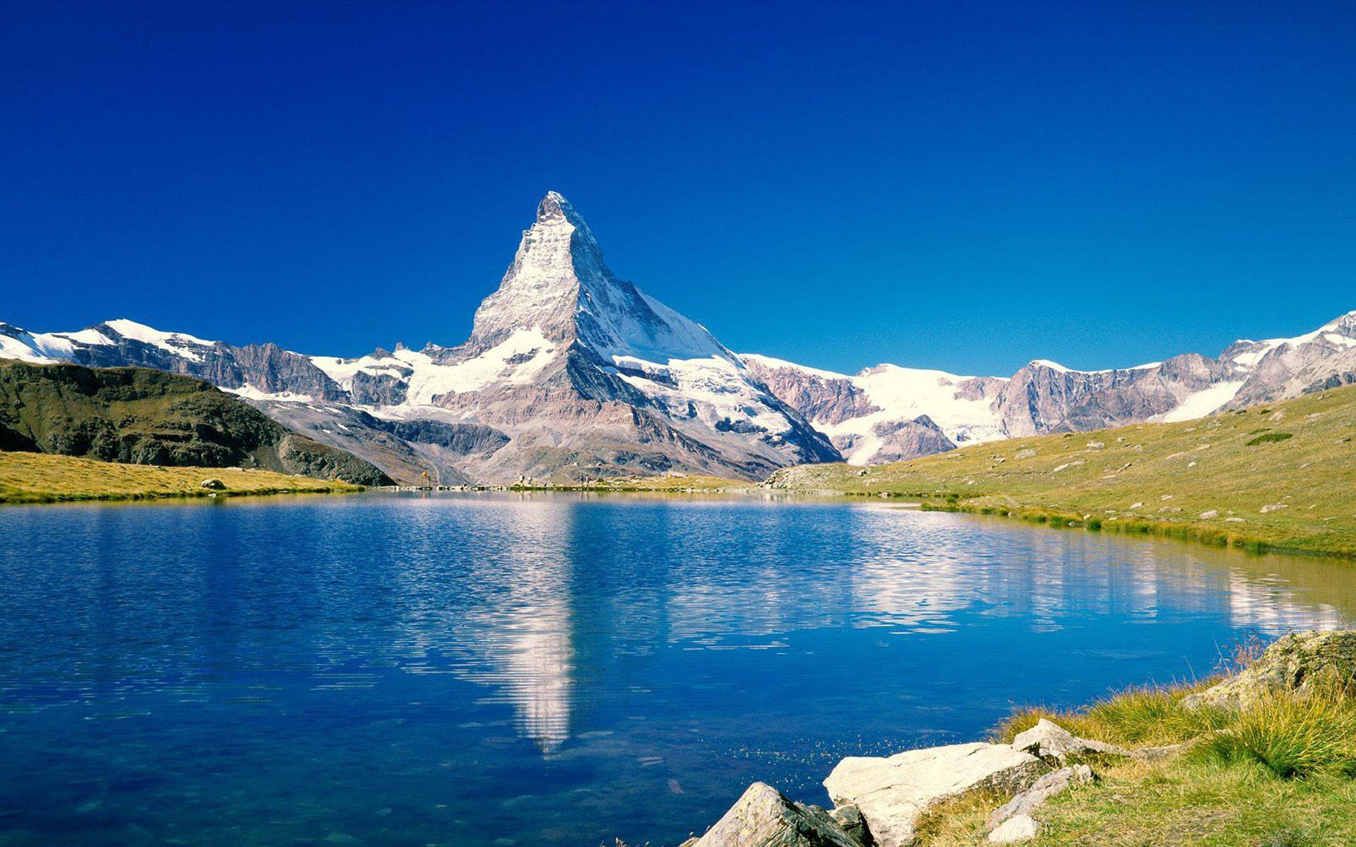 primavera lago montañas vegetación nieve