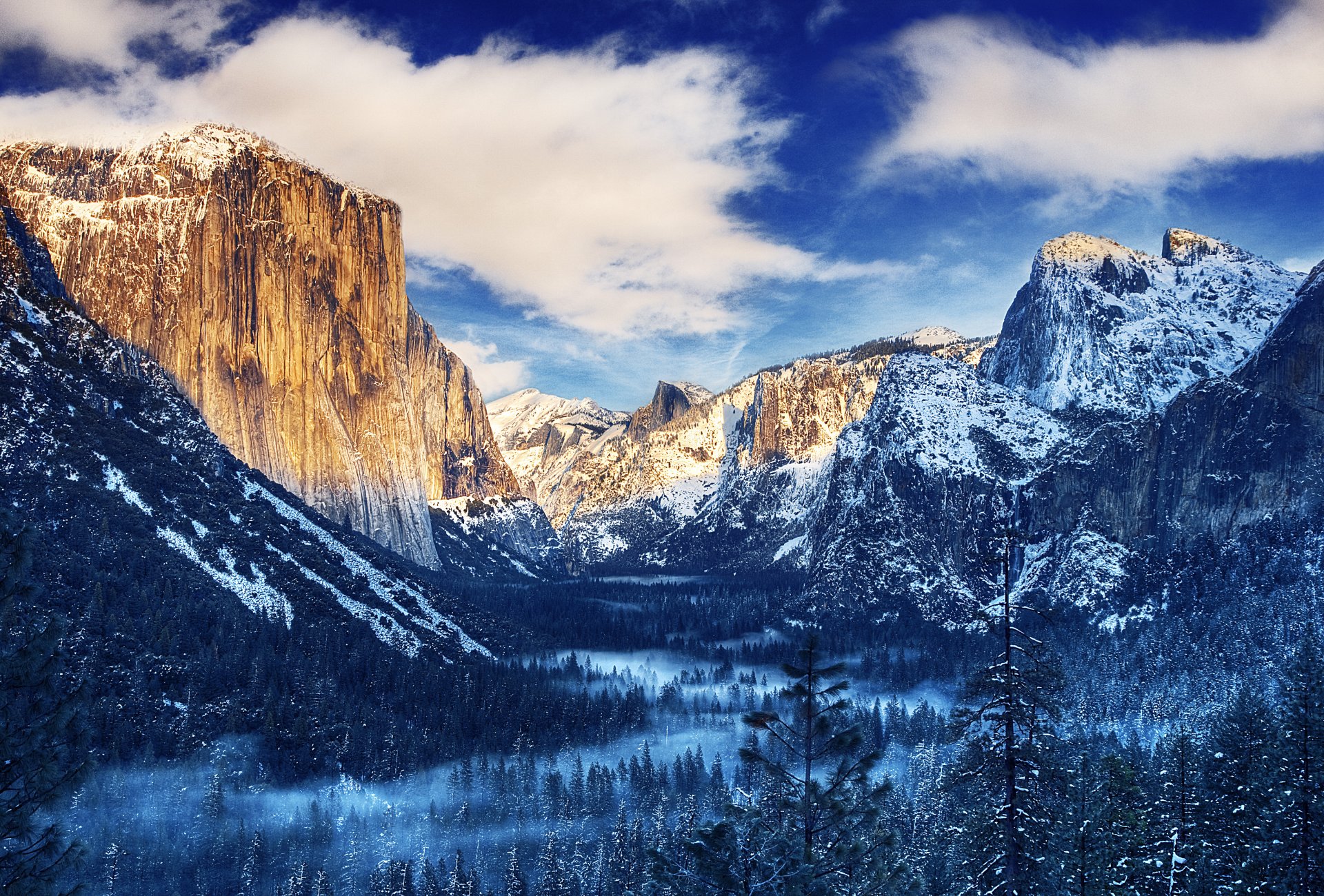 yosemite parco nazionale sierra nevada montagne foresta alberi cielo nuvole inverno neve nebbia