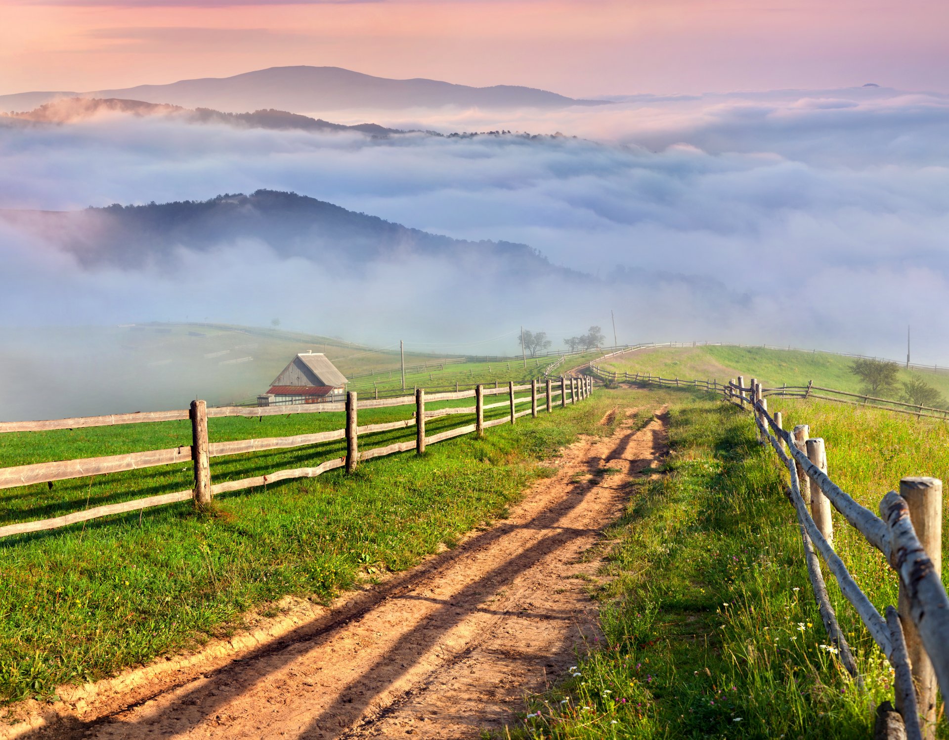 nature countryside landscape mountain grass meadows fog village road