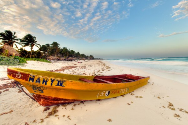 On the beach it will tan well the wind will all fly away