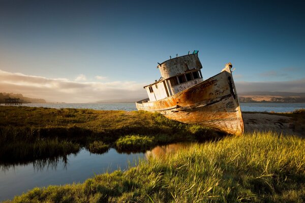 Ship on the background of the river