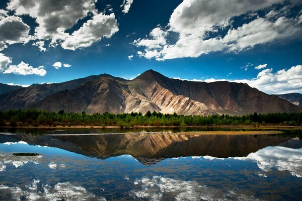 Great mountains with a display in the lake