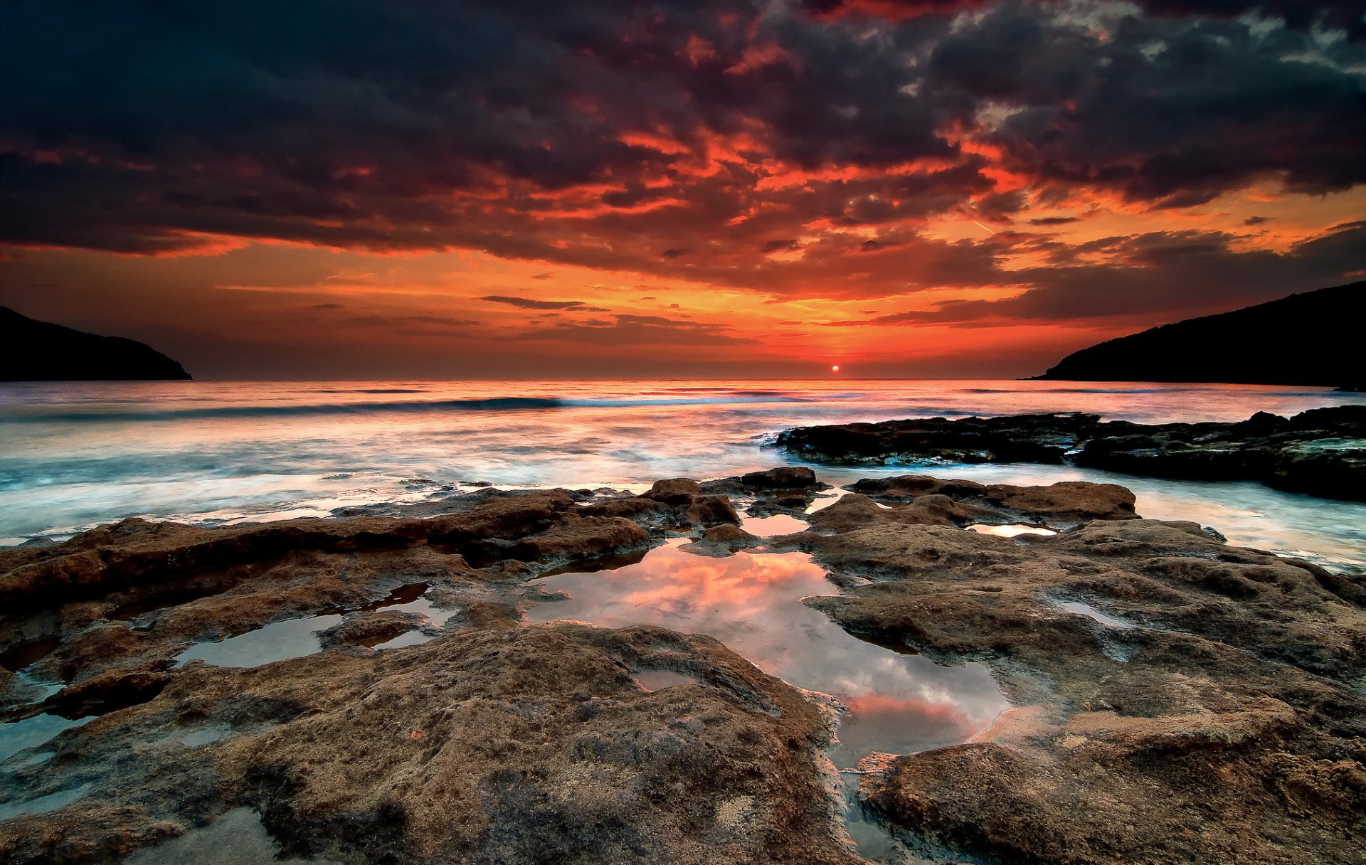 mar bahía costa puesta de sol