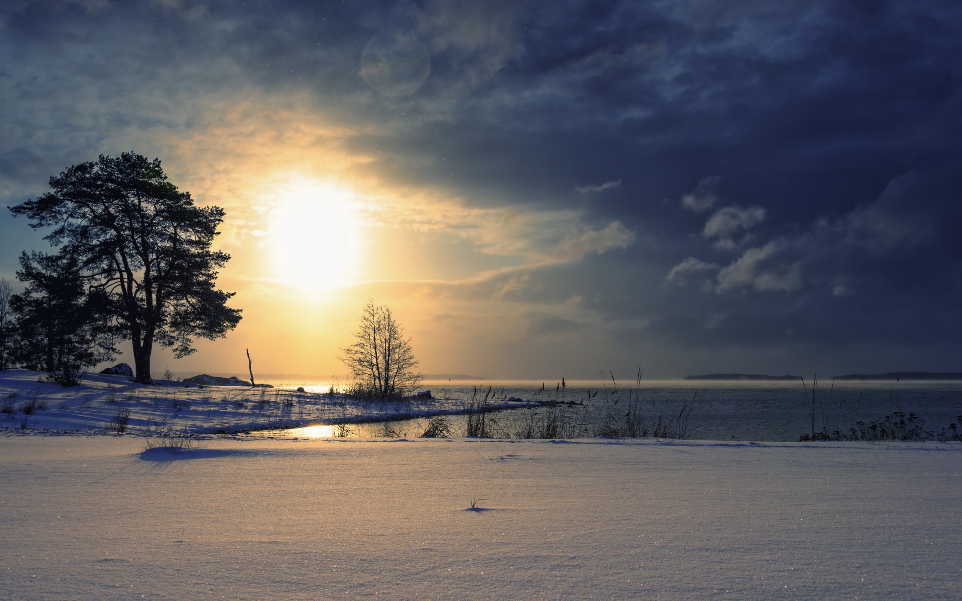 puesta de sol lago invierno paisaje