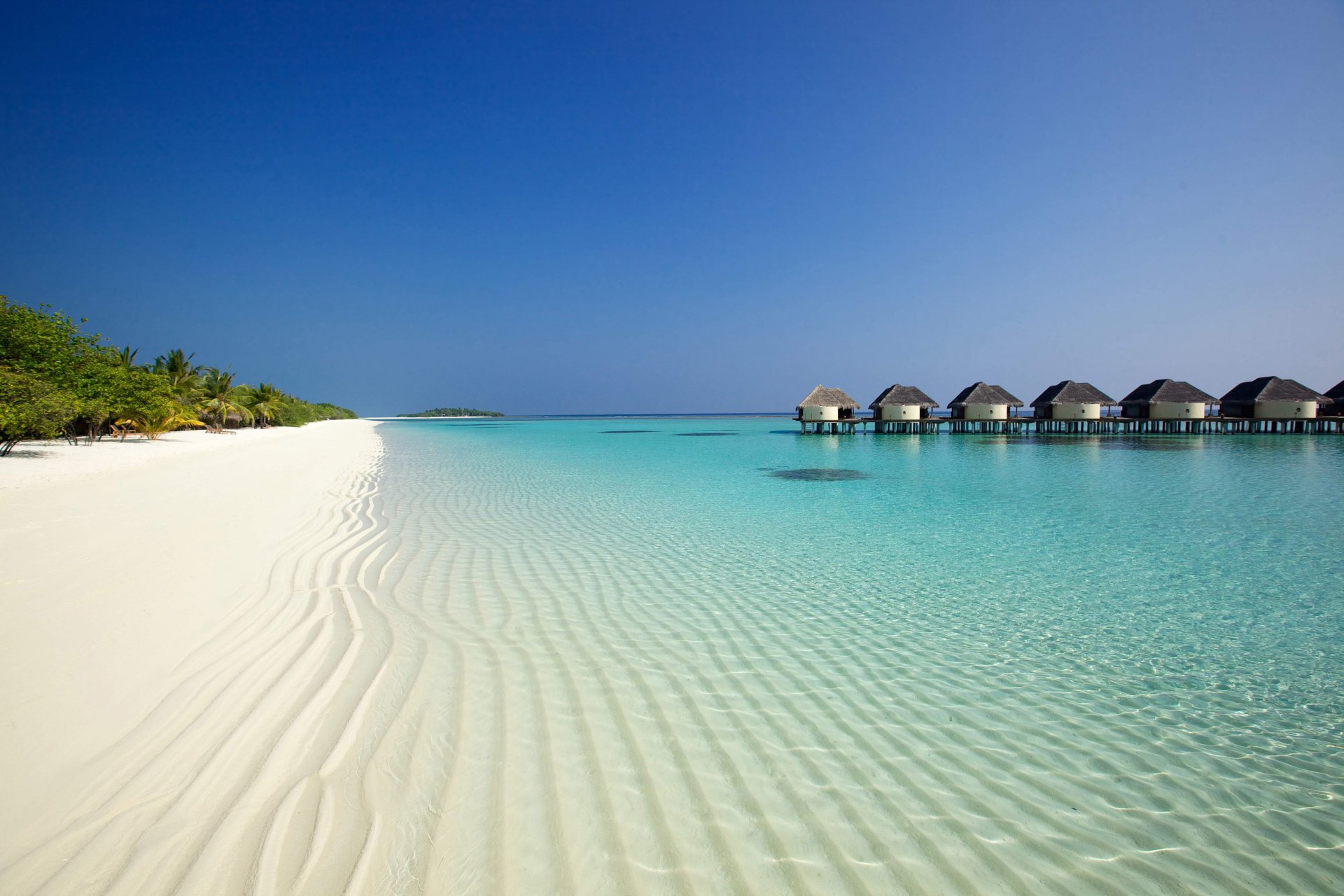 oceano spiaggia sabbia palme bungalow hotel kanuhura uomini