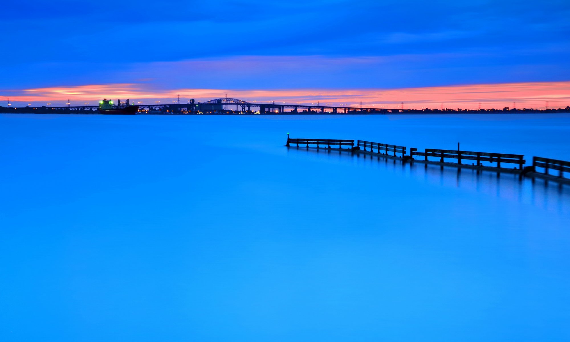 canada lago ontario sera luci città burlington tramonto