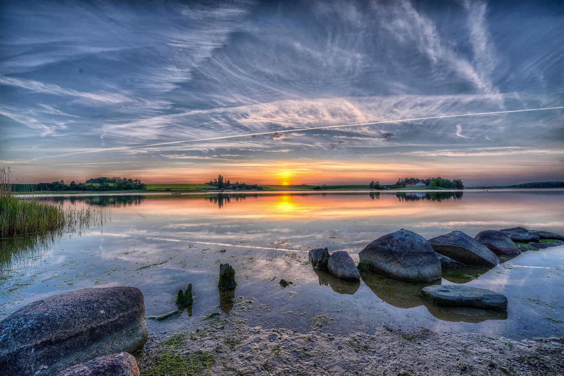 lago piedras cielo nubes sol