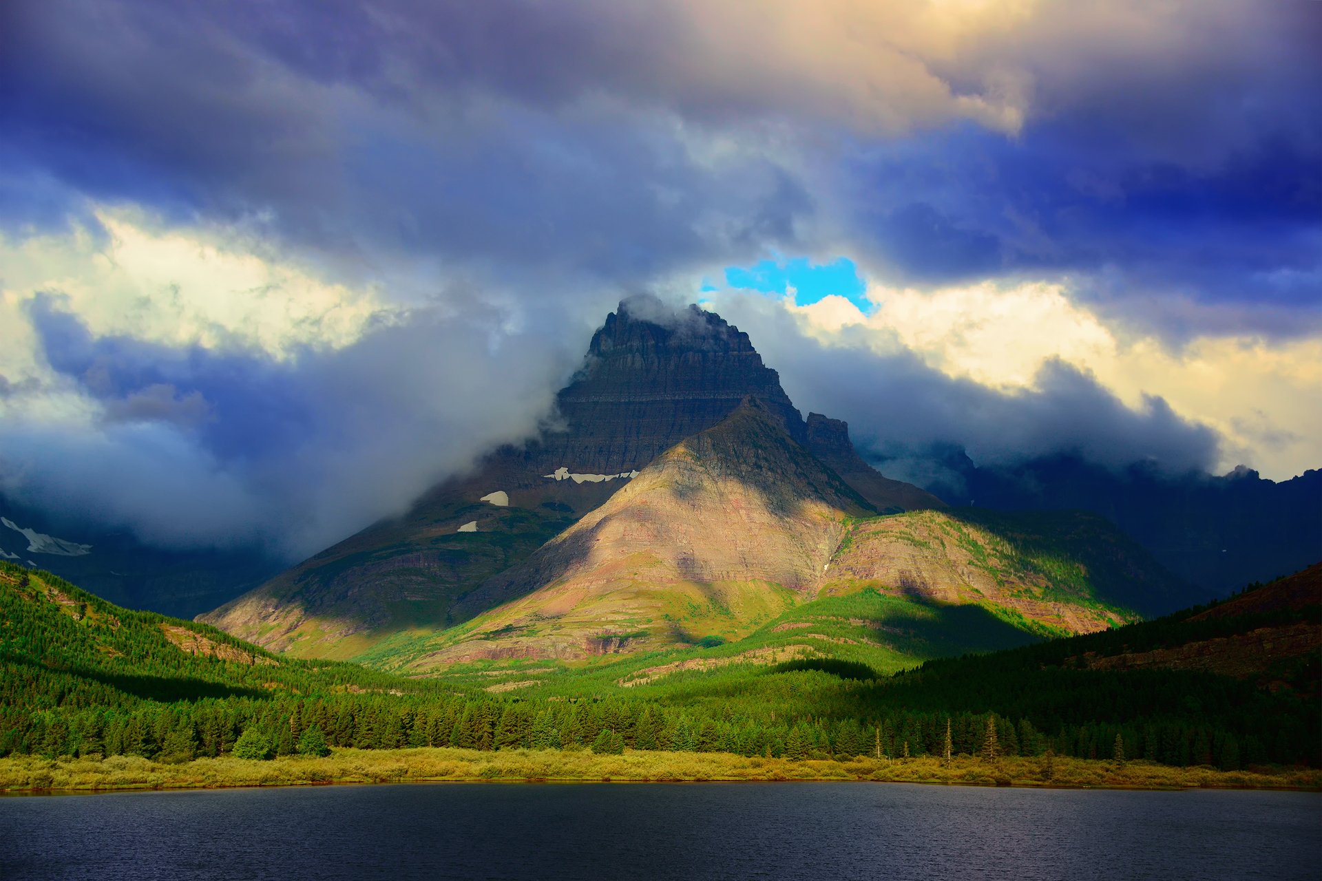 rocky mountains montana usa glacier national park mount wilbur mountain forest lake sky clouds cloud