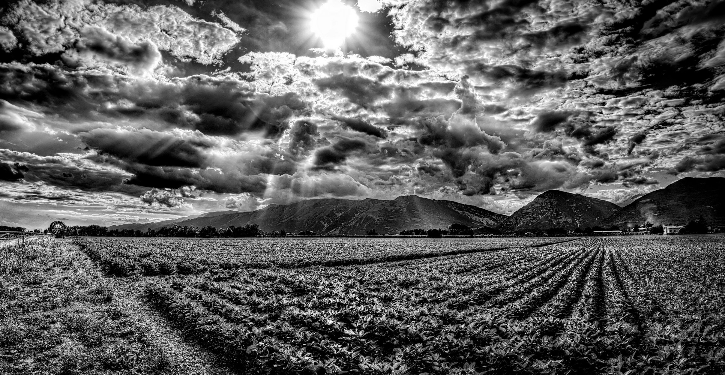 mountain sky sun rays the field h b clouds ☁