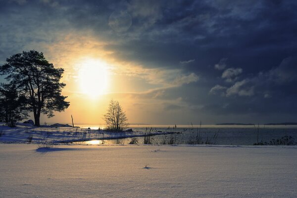 Sunset on the lake in winter