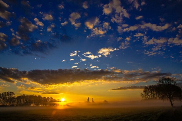 Sunset. The sky is in the clouds. Nature