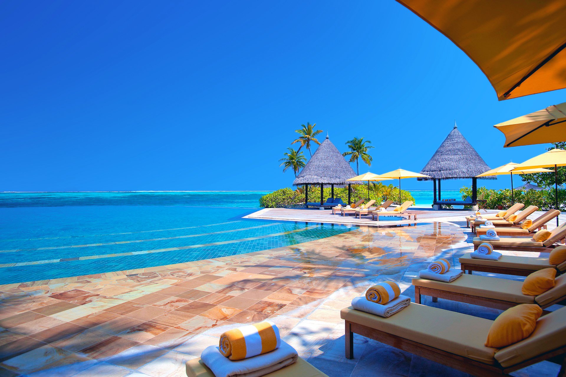 ky sea ocean the maldives sports umbrella bungalow couch pillow pool