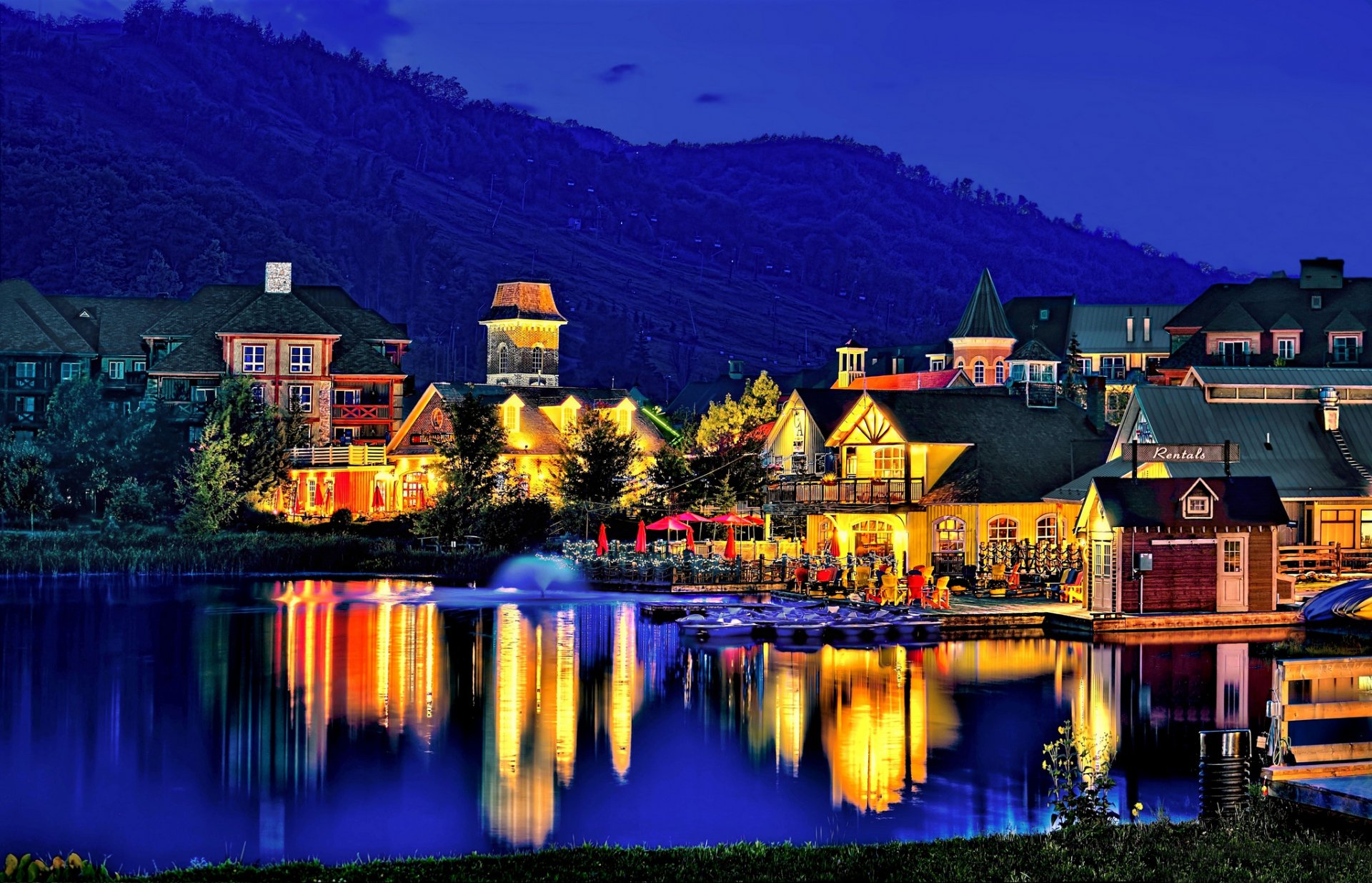 mountain slope village lake night twilight light