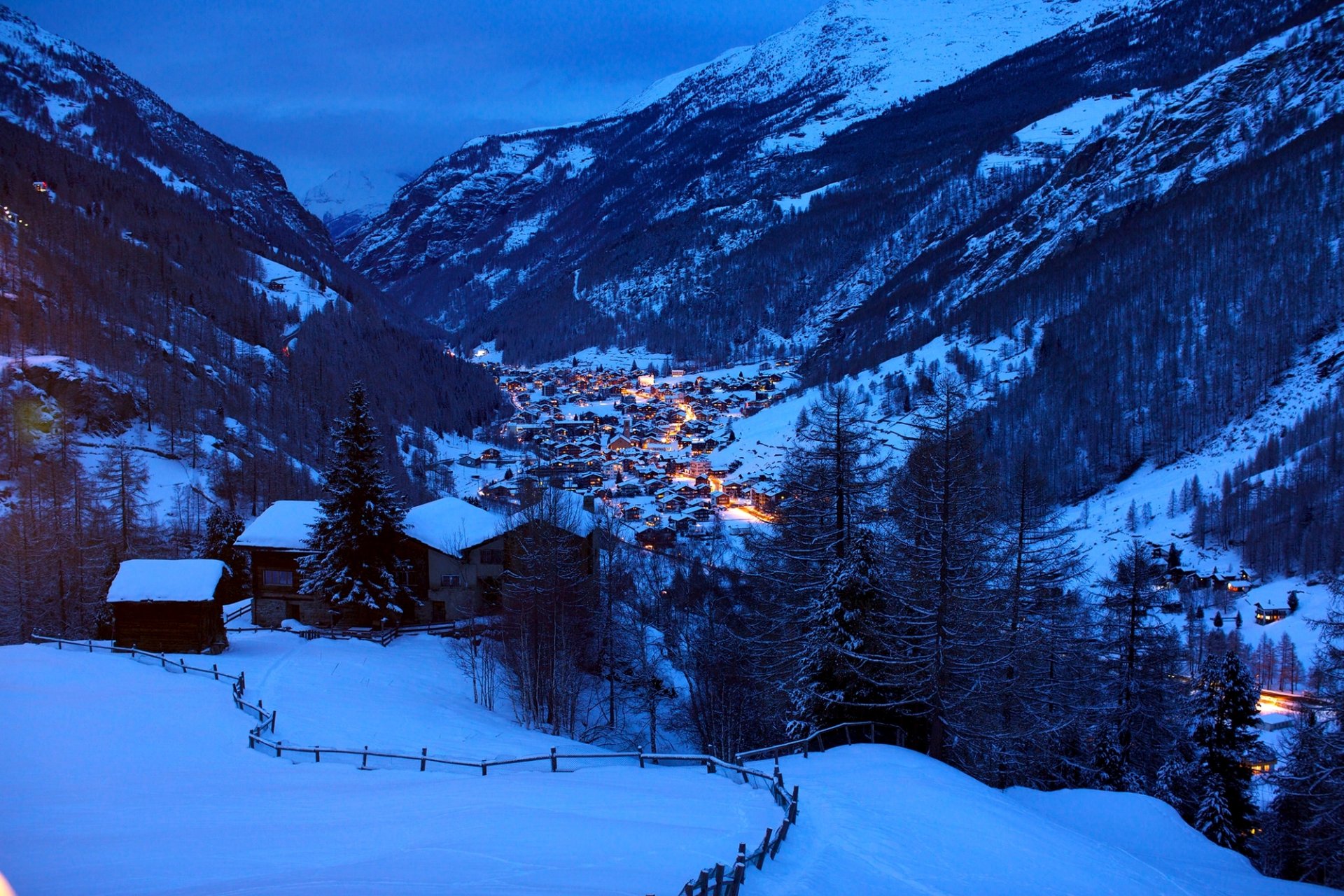 alps alpen switzerland mountains hills winter snow evening houses cabins chalets light nature landscape