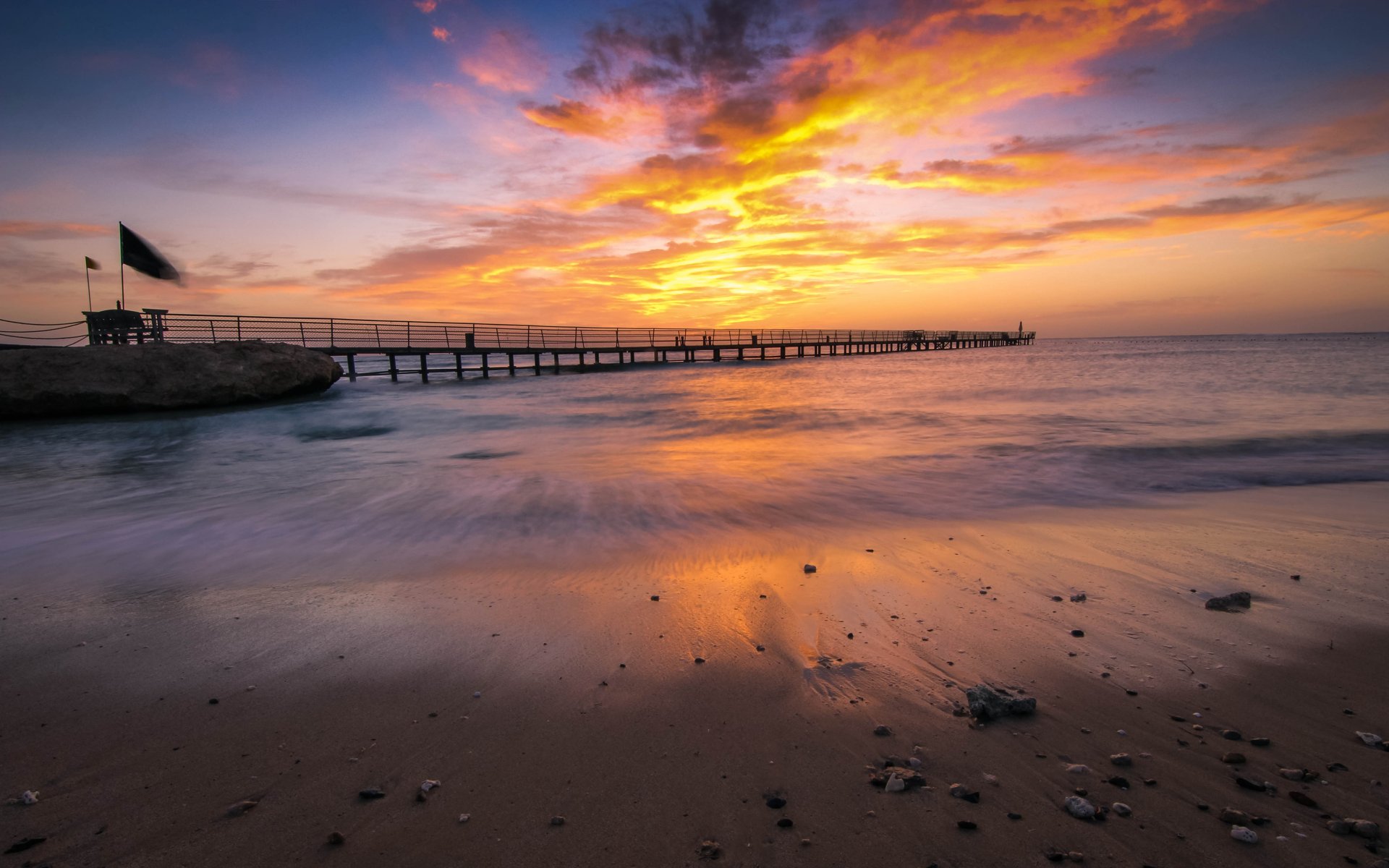 port ghalib marsa alam egypt beach shore ocean sunset clouds rock