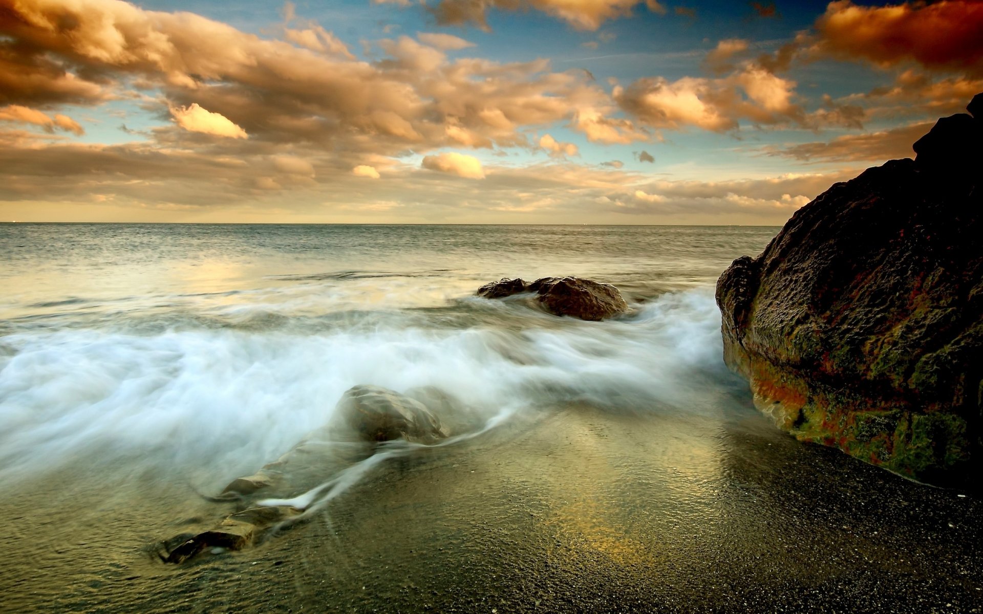 ea shore beach waves rocks clouds sky horizon