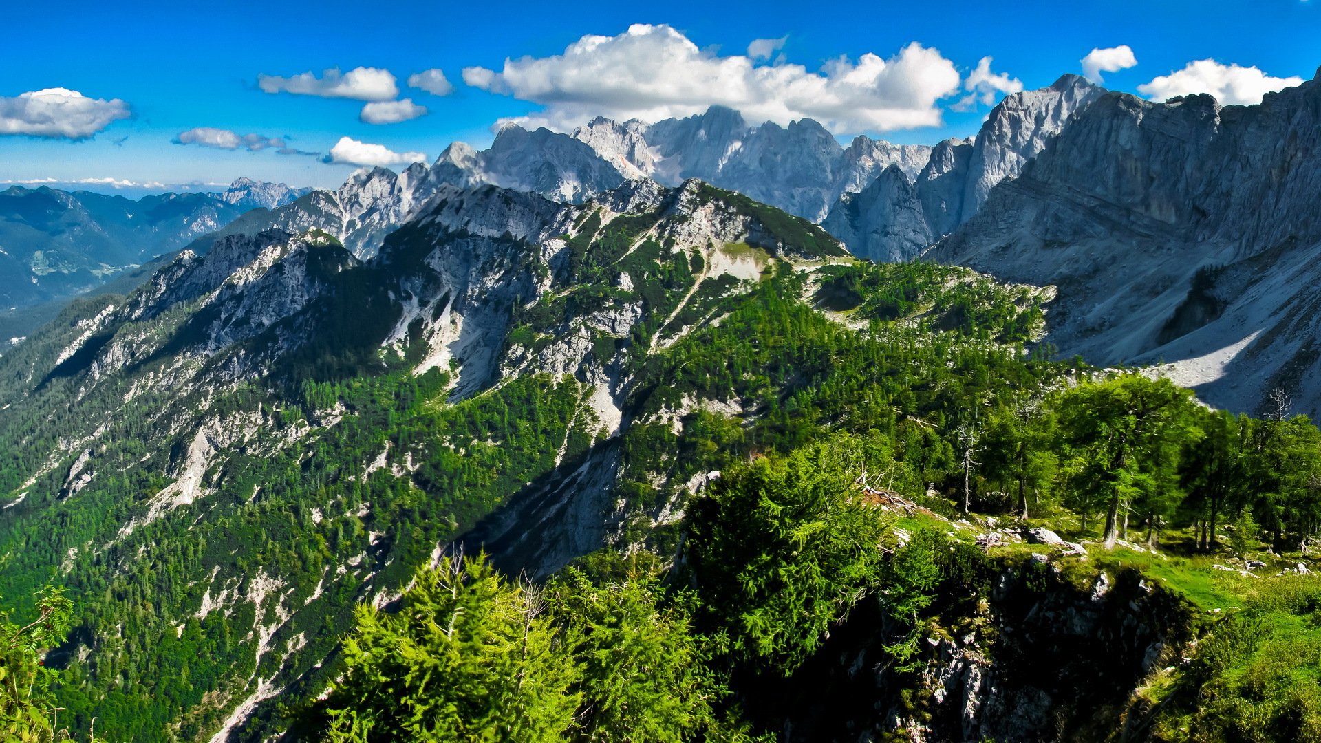 verano montañas rocas pendiente nieve cielo nubes naturaleza paisaje