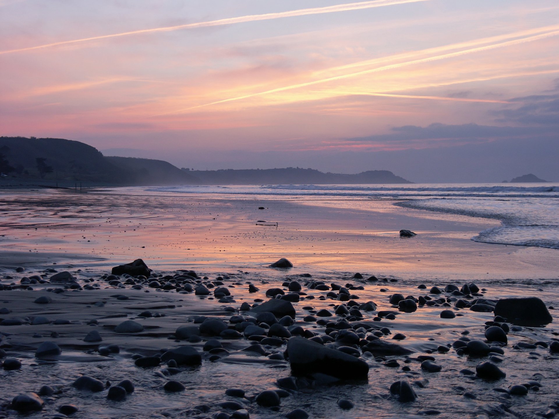 meer strand steine sonnenuntergang